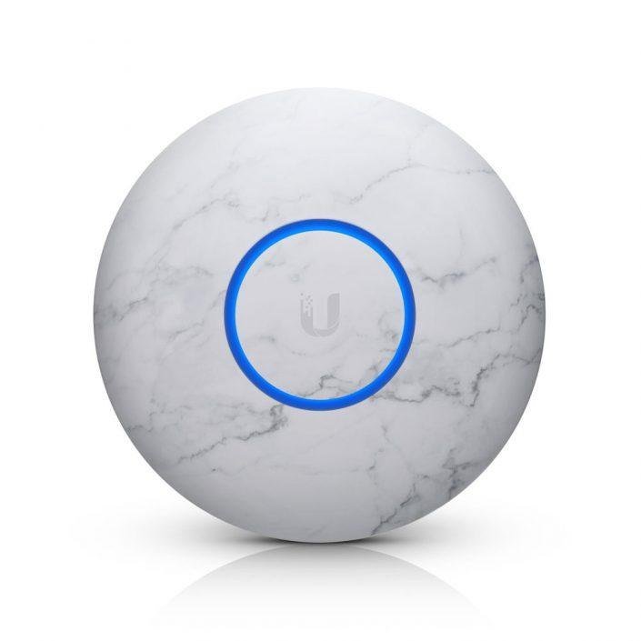 A Ubiquiti UniFi ceiling access point with a marble-effect decorative cover